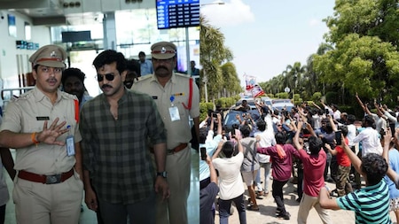 Pawan Kalyan and Ram Charan waving at fans